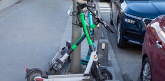 a scooter is parked on the side of the street