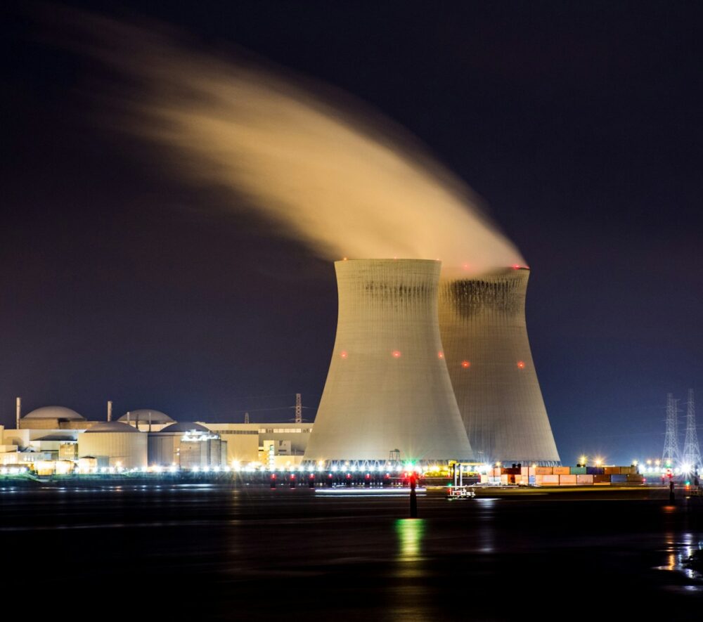 city skyline with lights turned on during night time