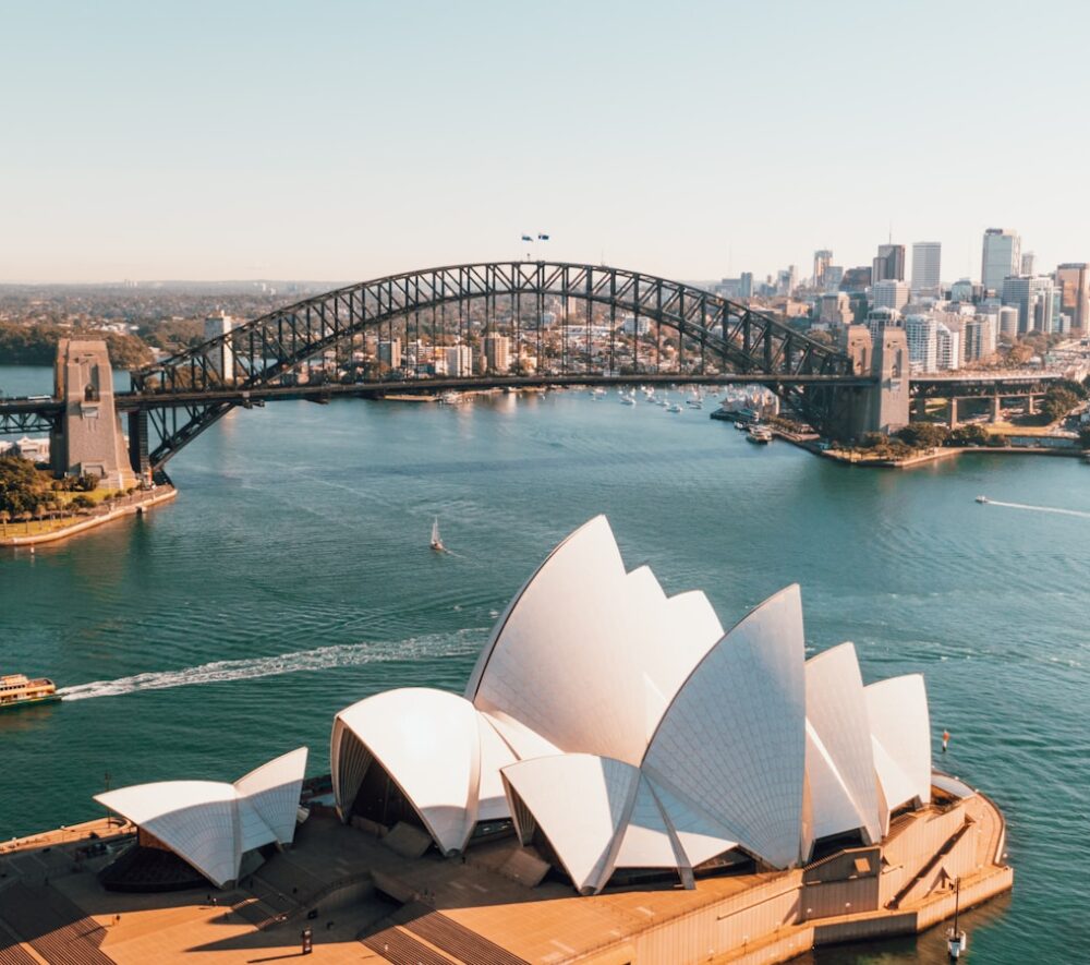 sydney opera house near body of water during daytime