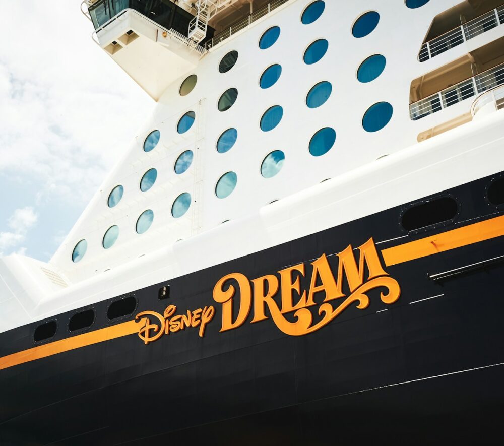a disney cruise ship with the word dream painted on it
