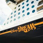 a disney cruise ship with the word dream painted on it