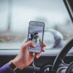 person taking selfie inside the car