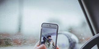 person taking selfie inside the car