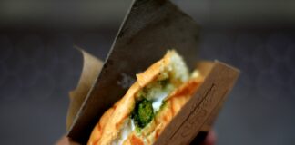 selective focus photography of sandwich with fillings