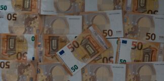 50 euro bill on clear glass table