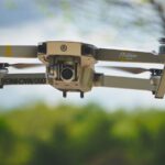 black and gray drone flying during daytime