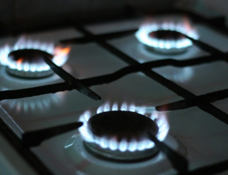 black gas stove with white and black gas stove